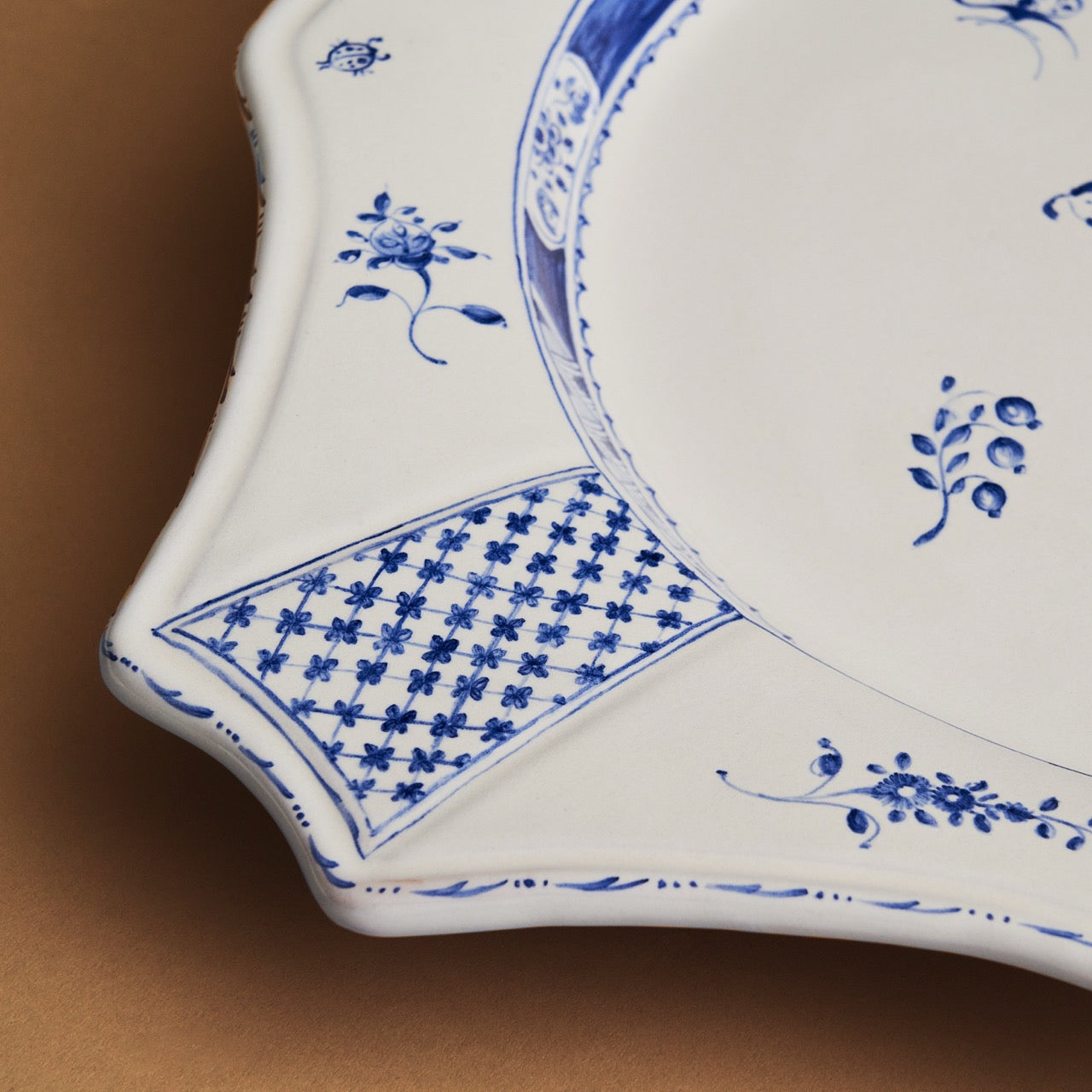 Piatto decorativo quadrato a coda di rondine