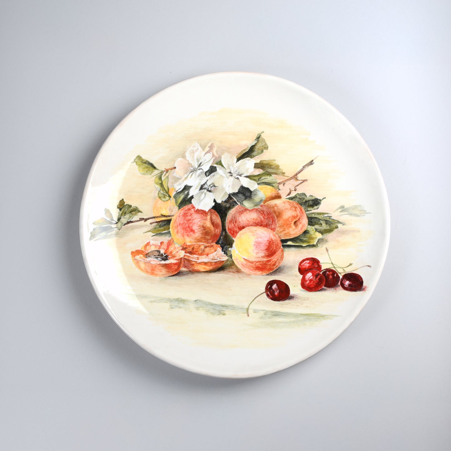 Smooth dish apricots, cherries, and flowers