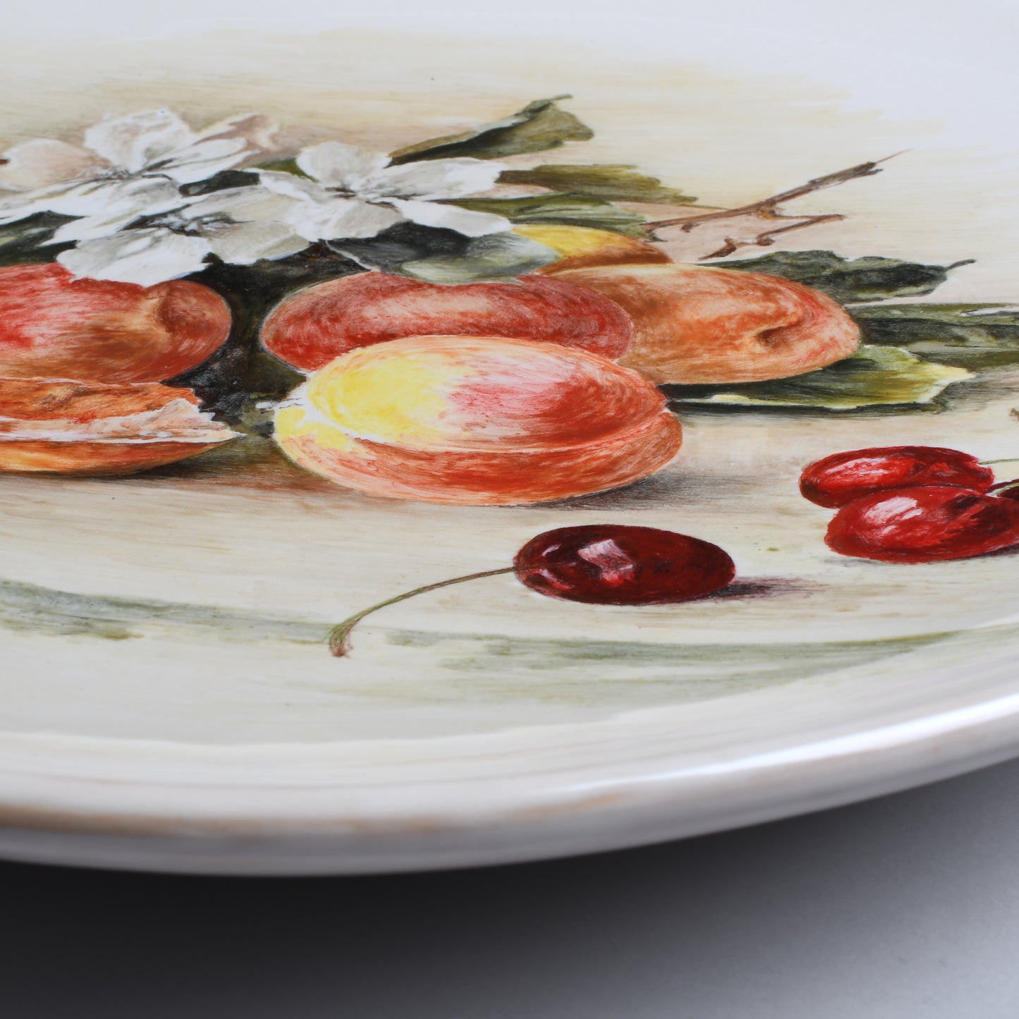 Smooth dish apricots, cherries, and flowers